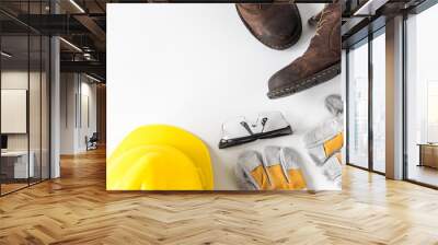 Construction site safety. Personal protective equipment on white background. Free space for text Wall mural