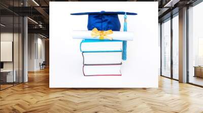 Graduation Cap With Diploma on Books Isolated on White Background Wall mural