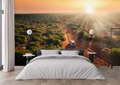 Australia, red sand unpaved road and 4x4 at sunset, freedom outback Wall mural