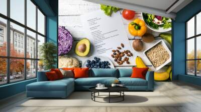 balanced diet plan with fresh vegetables and fruits on the table Wall mural