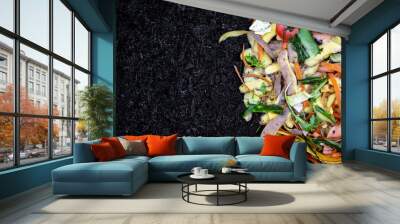 biodegradable kitchen waste on soil. composting organic food leftovers. copy space Wall mural