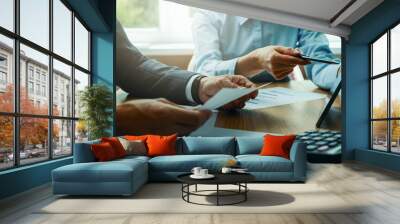 consulting services. businessman and business consultant working in office. company financial statem Wall mural