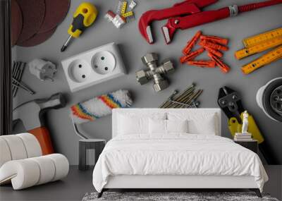 household hardware items. home improvement and repair. construction tools on gray background. top view Wall mural