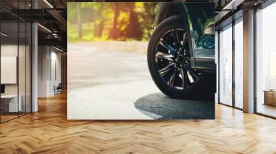 sport car with black alloy wheels on asphalt road. copy space Wall mural