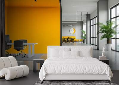 Minimalist office interior with an accent wall painted in vibrant yellow Wall mural