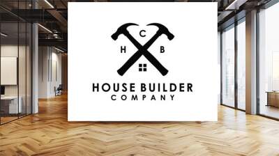 crossed hammer house builder construction renovation logo design vector Wall mural