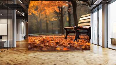 Welcoming wooden bench in a park with autumn leaves. Wall mural