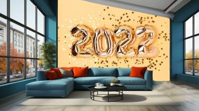 2022 golden balloons and stars confetti. Monochrome festive composition. Wall mural