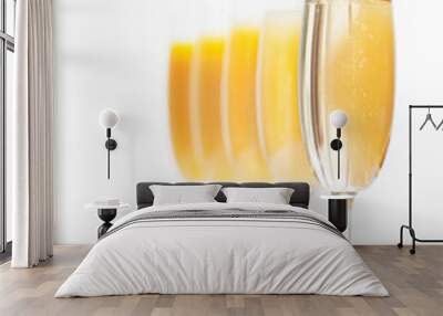 Fresh orange juice mimosas and champagne for brunch or bridal shower next to a window in natural light.  Arranged from from darkest to lightest (ombre effect with most orange juice to least) Wall mural