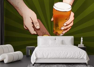 A hand holding a 2 up paddle and a glass of beer on a dark green khaki sunburst background Wall mural