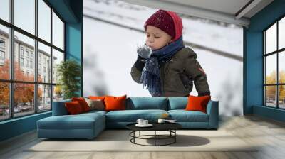 Boy Blowing Snow Wall mural