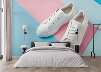 Fashionable white sneakers on a colored pastel background Wall mural