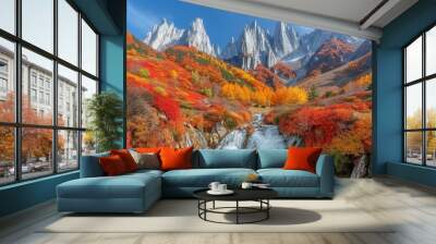 Breathtaking Autumn Landscape with Rocky Mountains, Colorful Foliage, and a Flowing Waterfall under a Clear Blue Sky Wall mural