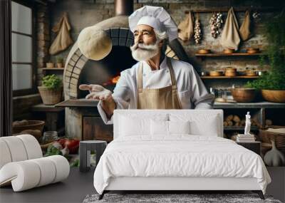 Chef tossing pizza dough in a brick oven kitchen Wall mural