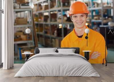 Smiling worker at a warehouse Wall mural