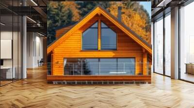 scenic view of a cozy cabin in autumn, surrounded by pine trees with warm tones, ideal for travel an Wall mural