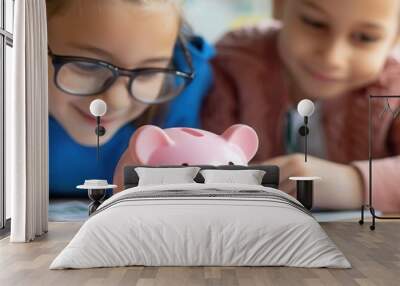 Children learning about savings and finance with piggy bank in classroom setting, showcasing financial education for young students. Wall mural