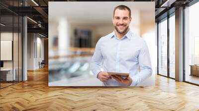 Professional business man in the business center with tablet computer Wall mural