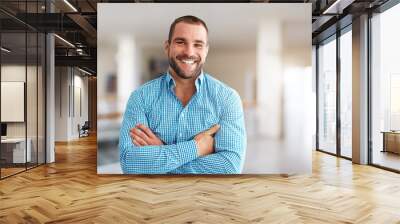 smiling man standing in business center Wall mural