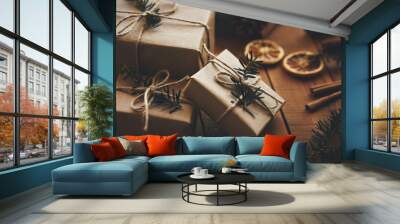 Three Christmas gifts on wooden boards with decoration Wall mural