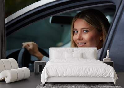 Woman driving her car Wall mural