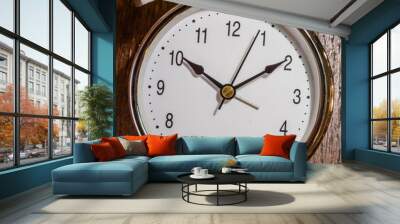 Classical alarm clock ringing on wooden background Wall mural