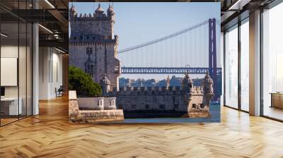 Scenic Belem Tower and wooden bridge miroring with low tides on Tagus River. Torre de Belem is Unesco Heritage and icon of Lisbon and the most visited attraction in Lisbon, Belem District, Portugal Wall mural