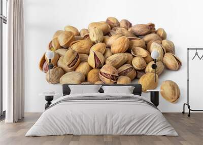 Handful of pistachio nuts isolated on a white background Wall mural