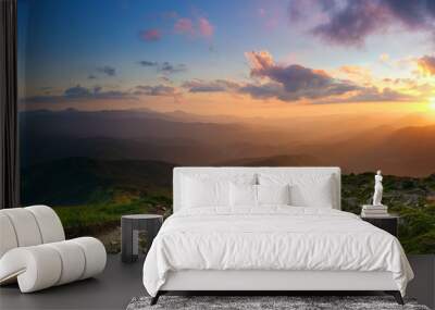 Amazing mountain landscape with colorful vivid sunset on the cloudy sky, natural outdoor travel background. Beauty world. Panoramic view. Wall mural