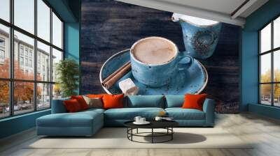 Cup of coffee with milk, cinnamon and sugar Wall mural