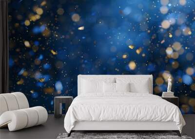 Falling confetti on blue background, abstract background with dark blue and gold particle. Golden light shine particles Bokeh on navy blue background, celebration concept Wall mural