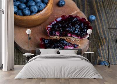 A fresh cake made of buttercream and blueberries Wall mural