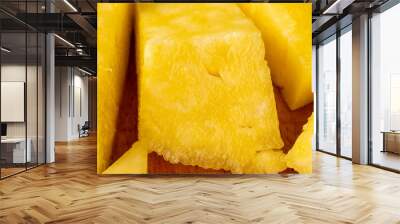 ripe yellow pineapple cut into pieces Wall mural