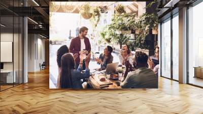 Applause, restaurant and business people in lunch meeting for discussion, planning and profit goal. Cafe, teamwork success and men and women clapping for winning, collaboration and achievement Wall mural