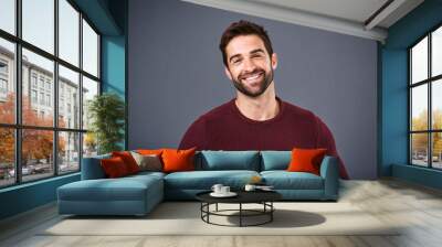 Happy, handsome or headshot portrait of a man isolated on studio background with confidence or smile. Model, mock up space or face of male person smiling with happiness or positive mindset in Italy Wall mural