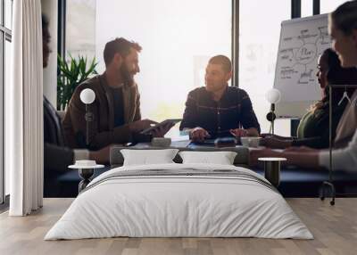 I think we should stick to basics. Shot of a group of motivated business people having a meeting and discussion in a boardroom. Wall mural