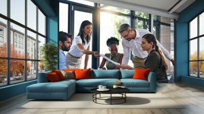 They always do great work together. Shot of a group of businesspeople having a meeting in a boardroom. Wall mural