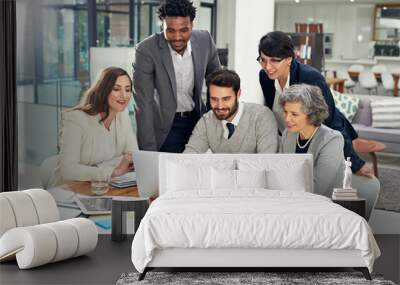 Theyre feeling positive about their project. Cropped shot of a group of businesspeople meeting in the boardroom. Wall mural