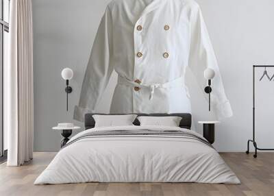 Plain White Chef s Coat with Five Front Buttons on Neutral Background Wall mural