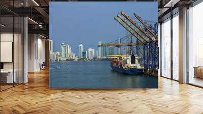 Cranes in port. container cargo freight ship. containers in the commercial port..  commercial containers in the port. Wall mural