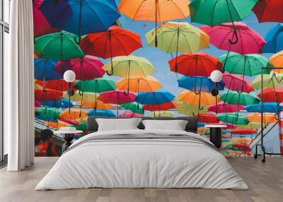 Colored umbrellas hanging in festival days in Ho Chi Minh city, Vietnam Wall mural