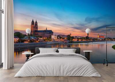 Magdeburg, Germany. Panoramic cityscape image of Magdeburg, Germany with reflection of the city in the Elbe river, during sunset. Wall mural