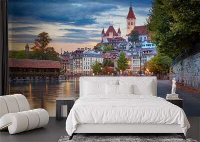 Thun, Switzerland. Cityscape image of beautiful city of Thun with the reflection of the city in the Aare river at sunset. Wall mural