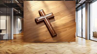 Wooden christian cross on a wooden background.Christian religion concept. Wall mural