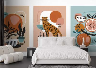 Set of three modern poster designs with a wild cat or leopard, potted plants and healthy fresh fruit on abstract patterned backgrounds, colored vector illustration Wall mural