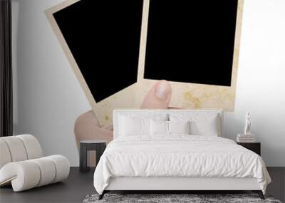 two photo frames in a hand Wall mural