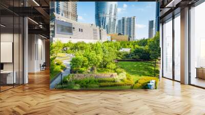 empty, modern square and skyscrapers under sunbeam Wall mural