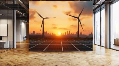 A field of solar panels is in the foreground with two wind turbines in the background at sunset with a city skyline barely visible. Wall mural