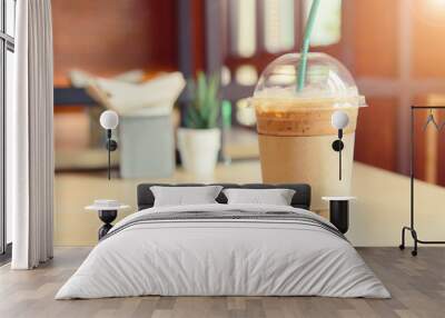 ice coffee on the table with sunlight Wall mural