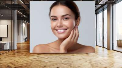 Beautiful young woman touching her clean face with fresh healthy skin isolated on white background. Generative ai. Wall mural